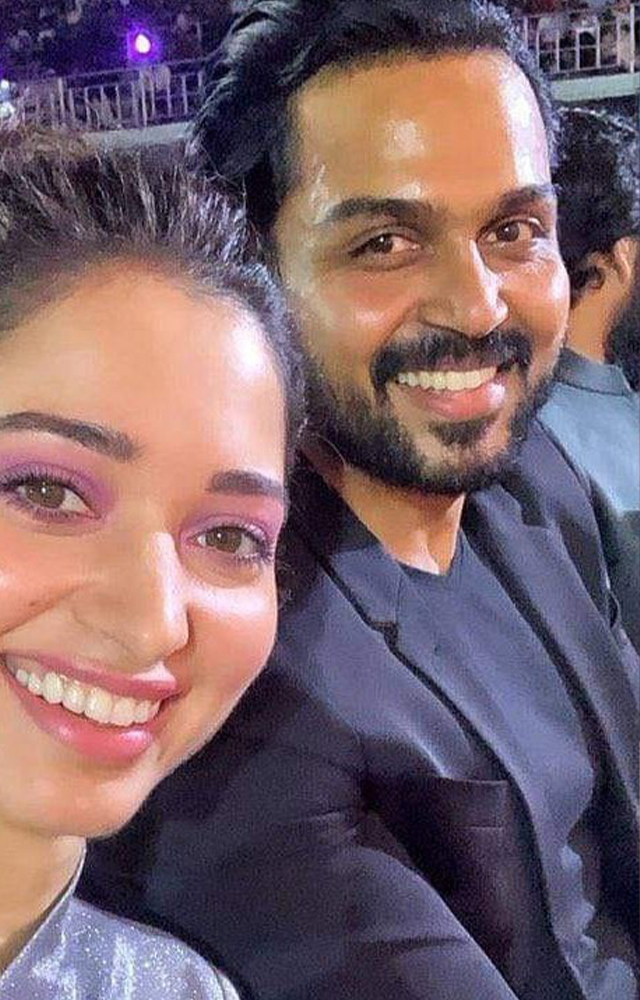 Karthi sharing some fine moments with actress Thamannah bhatia at the audio Launchof his most awaited movie Japan