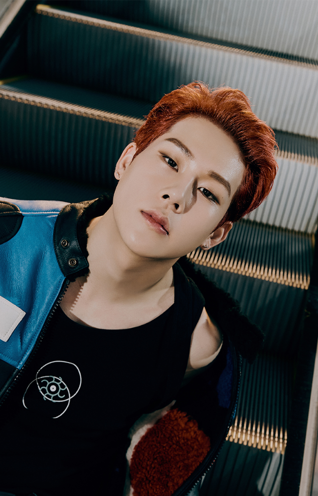 Joohoney has produced hits like 'MOHAE' and 'Stand Up' for Monsta X, showcasing his versatile production skills and musical instincts.
