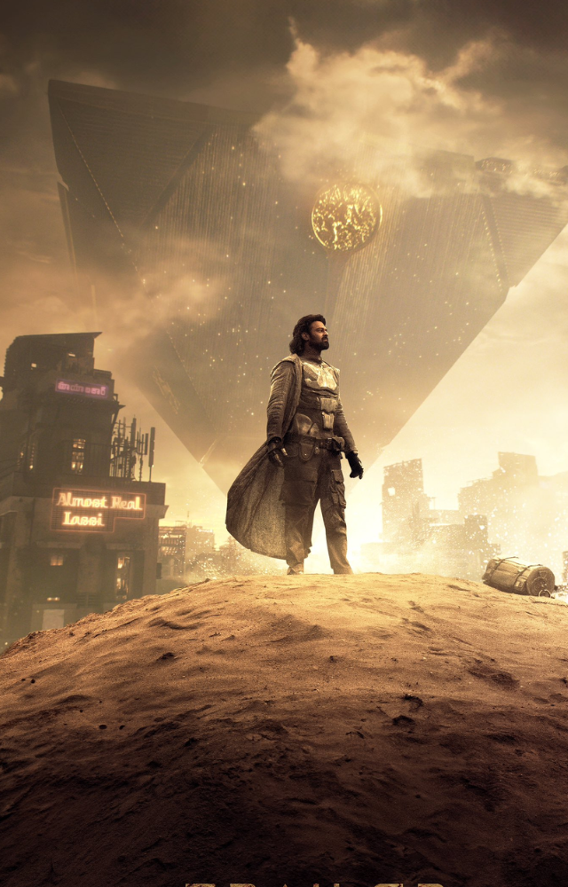 In the latest poster, the film`s protagonist, Prabhas, is seen suited up and standing in the Kalki 2898 AD`s futuristic world, which is called `Complex`.