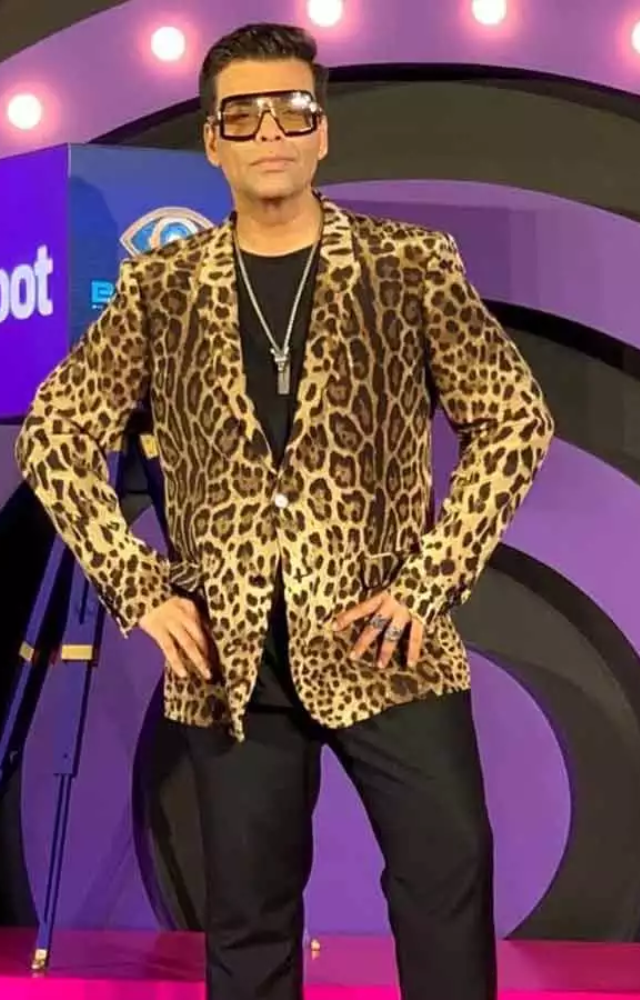Leopard prints are considered a bold choice for men in the industry, but Karan Johar aced the outfit with designer glasses.
