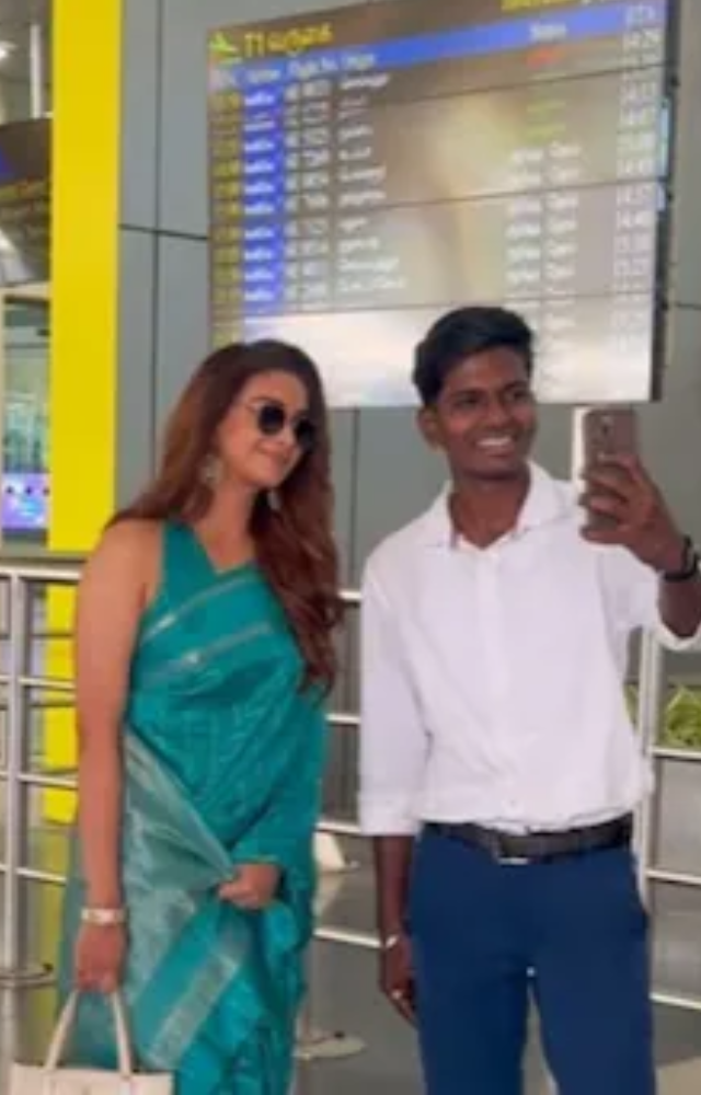 Keerthy stunned everyone in a traditional saree, turning heads as she gracefully moved through the terminal.
