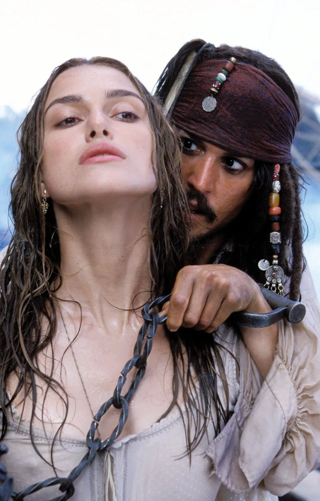 As Elizabeth Swann in The Curse of the Black Pearl, she evolves from a refined lady to a spirited adventurer alongside pirates.