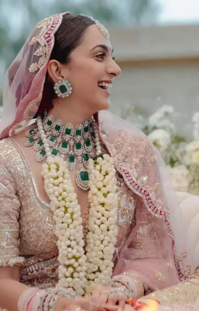 The Shershaah actress married Sidharth Malhotra in February 2023. She looked mesmerizing in a soft pink bridal lehenga designed by Manish Malhotra.