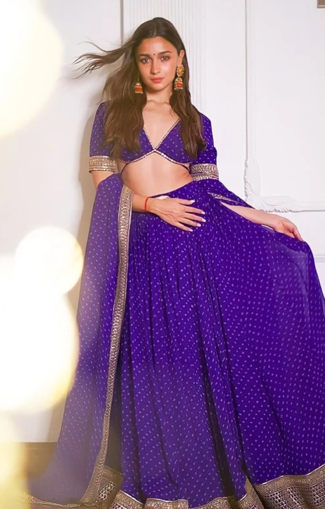 Alia`s youthful and playful lehenga styles, often in pastel hues, make her a millennial favorite.