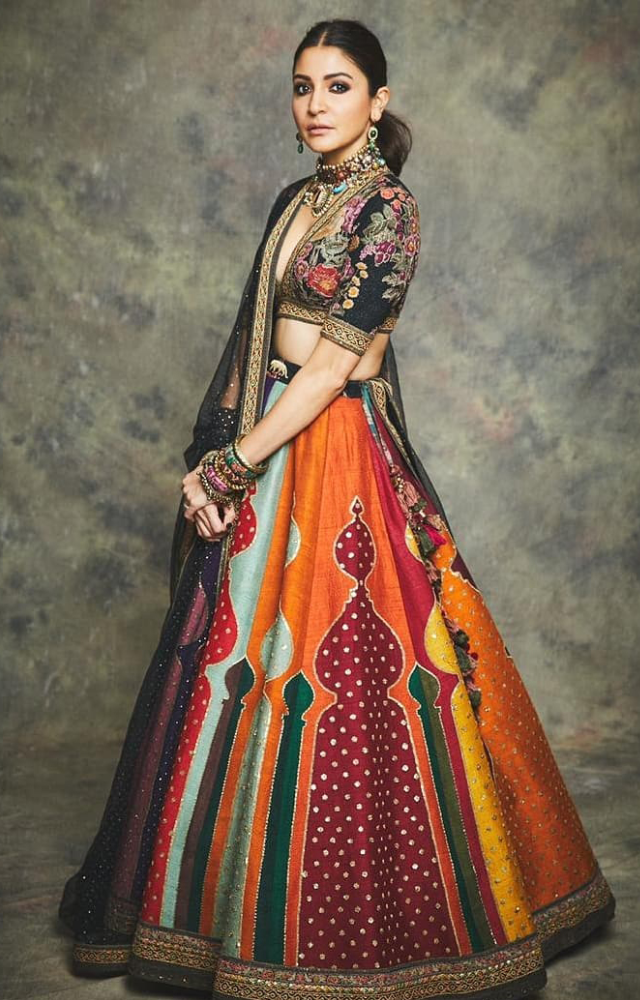 Anushka`s lehenga choices reflect her understated elegance, blending traditional elements with a modern aesthetic.
