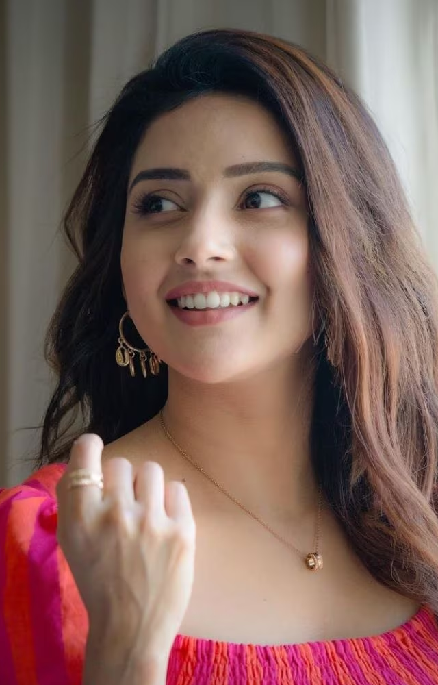 Mahima Nambiar effortlessly defines elegance with her radiant poise and beauty. Her captivating gaze weaves a spell of timeless allure and grace