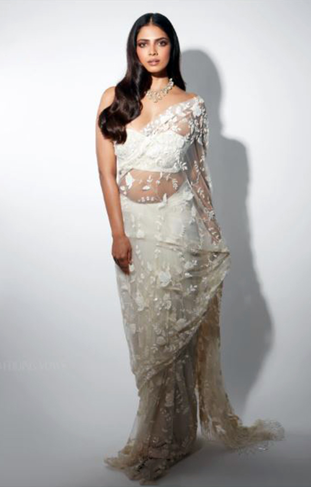 Malavika Mohanan consistently stuns her fans with  hot outfits. Her fashion choices reflect a blend of elegance, trendiness, and effortless style.