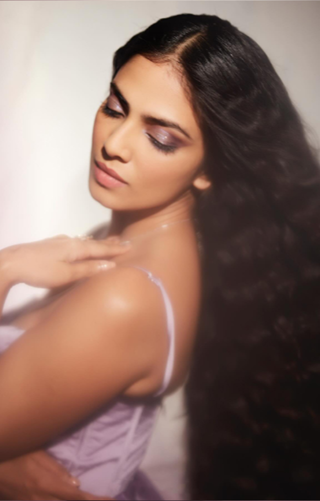 Malavika Mohan`s sultry attire enhances her allure and makes her stand out.