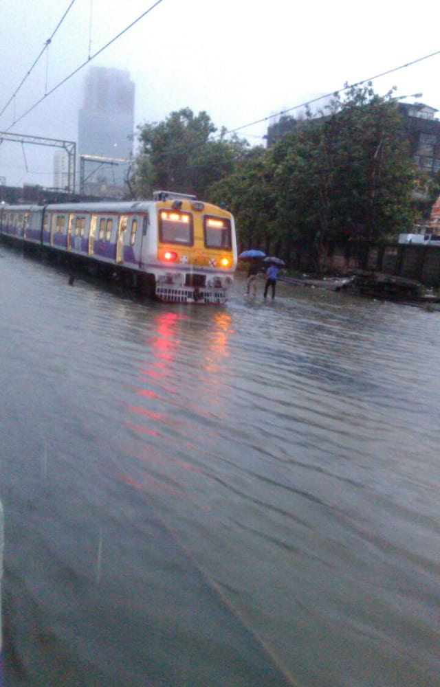 Mumbai public transport has been disrupted, delaying the local trains, which has caused severe inconvenience to the commuters.