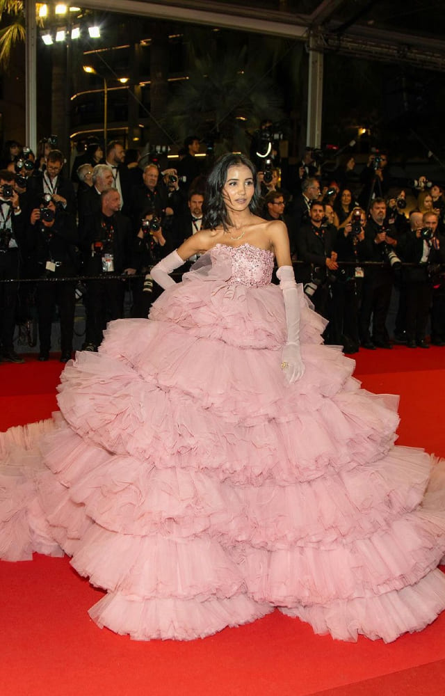 The Indian influencer went on to create history at the Cannes Film Festival by customizing her own ruffle-pink dress from scratch.