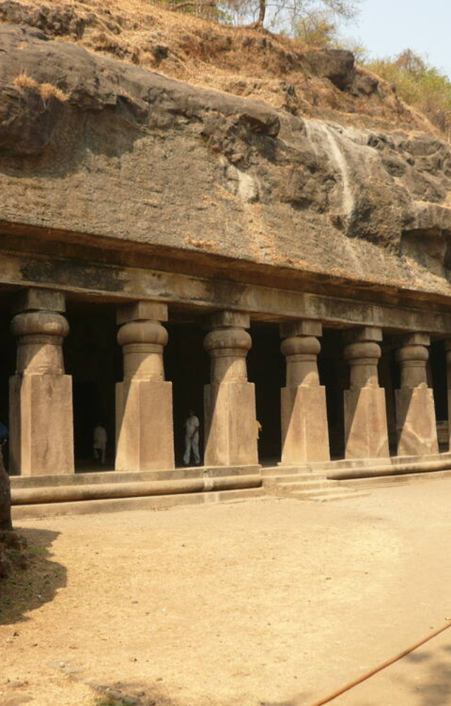 Thick rock works the best at blocking radiation. Earth acts as a natural insulator. Take shelter at nearby caves, as they are natural bunkers.