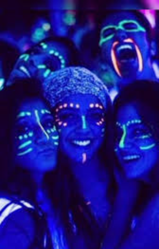 Adorn your space with glow sticks, neon lights, and fluorescent decor. Dance to your favorite tunes while enjoying snacks and drinks under the glowing ambiance.