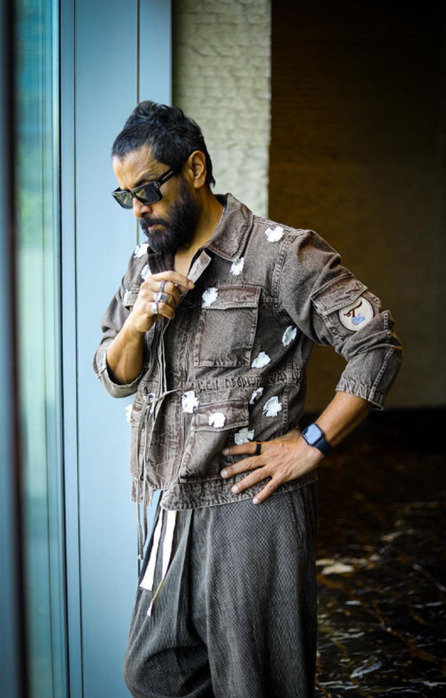 With his magnetic presence, Chiyaan Vikram captivates the camera in a ravishing display of charisma and charm.