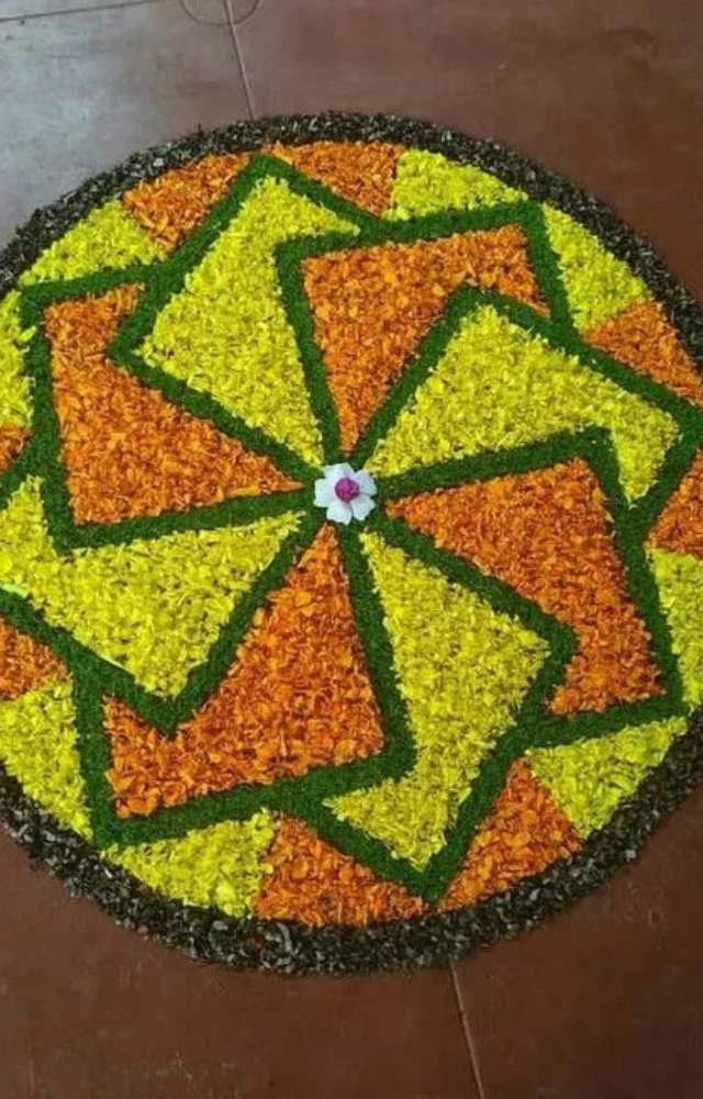 A key tradition involves creating intricate floral designs on the ground, known as Pookalam, which symbolize prosperity and welcome.