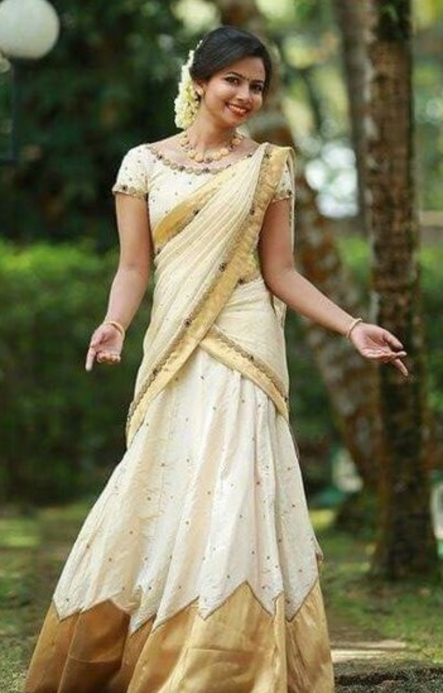 Participants traditionally wear new clothes, with women donning the classic kasavu saree and men wearing mundu, reflecting the festival`s cultural heritage.