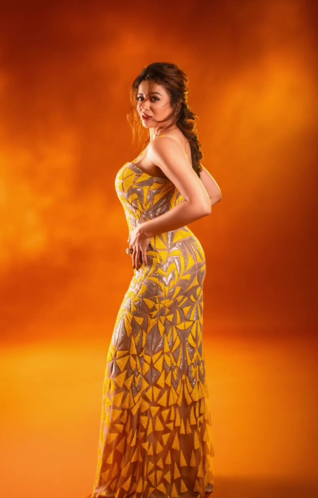 Neha Pendse in yellow gown