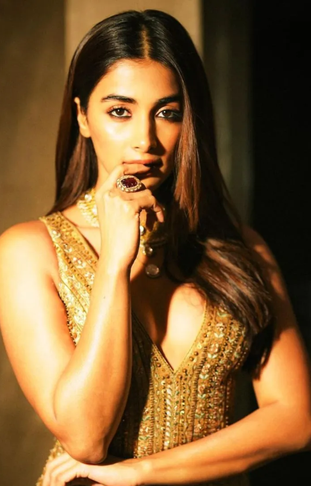 The bodycon style accentuates her curves and highlights her figure