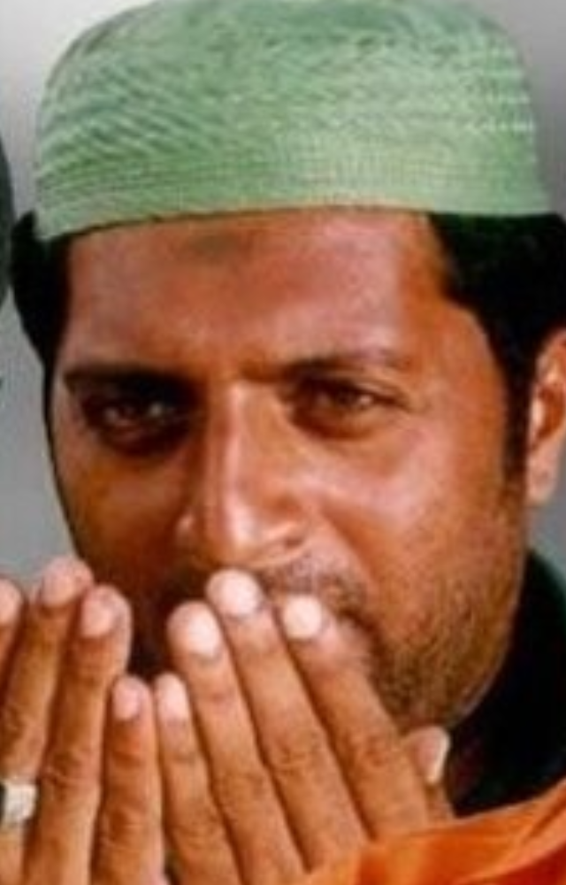 Playing a rickshaw puller entangled in communal strife, Prakash Raj delivers a moving performance that highlights his emotional depth.