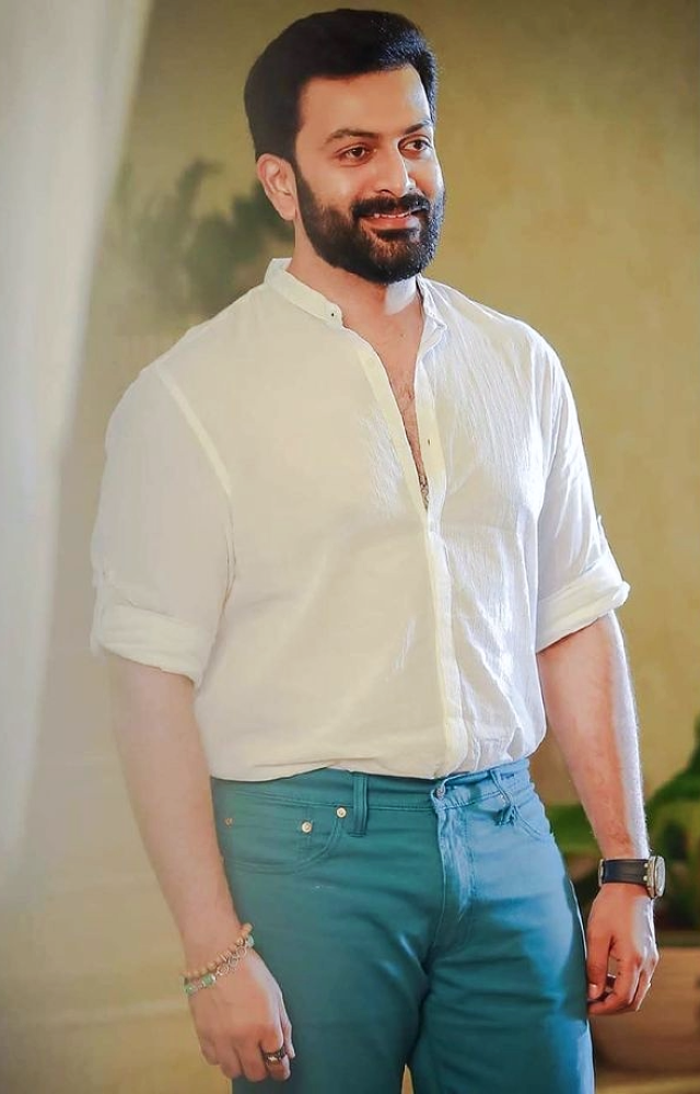 Beyond the silver screen, Prithviraj’s off-screen elegance is equally captivating. Whether at events or in candid moments, he effortlessly combines style