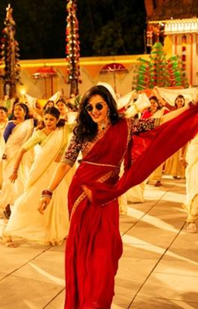 Actress Manju Warrier, in a stunning red saree, captivated the audience with her powerful, rhythmic dance moves, winning their hearts.



