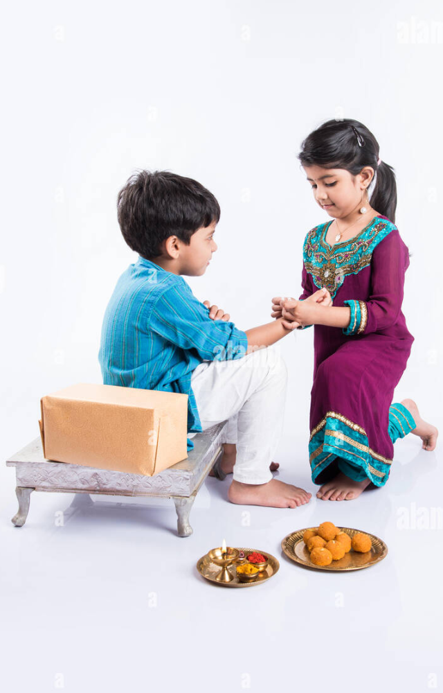 The ceremony of tying a rakhi symbolizes a sister`s prayer for her brother`s well-being and the brother`s promise to protect his sister.