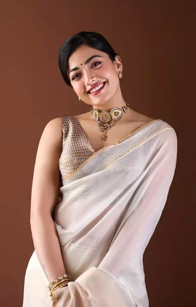 Rashmika`s saree look also incorporated modern elements such as contemporary blouse designs or trendy accessories, striking a perfect balance 