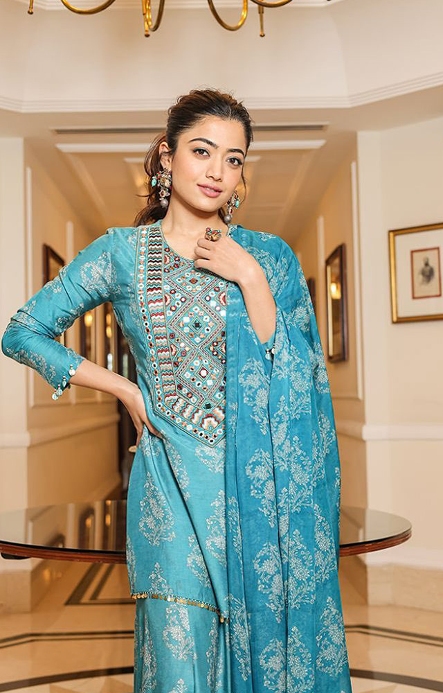 Explore Rashmika`s diverse ethnic looks, each a masterpiece of grace. Adornments of tradition, draped in modern allure, redefine fashion elegance.