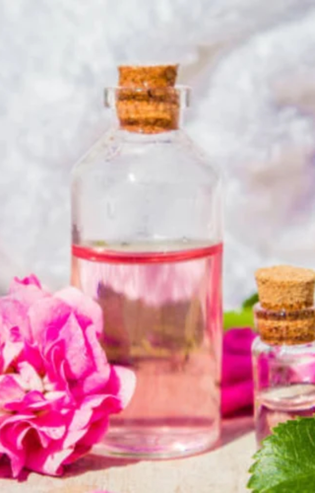 Add rose water to castor oil or coconut oil. Massage it on your scalp gently to reduce irritation and dandruff.