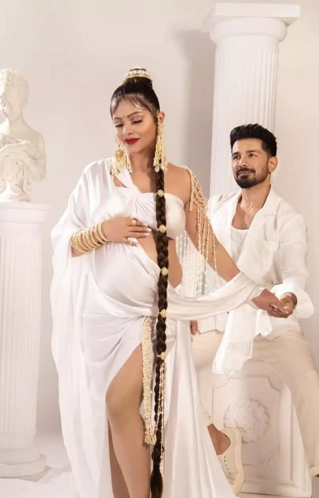 The new mommy looked a vision in white in their maternity photoshoot. The couple looked stunning as they twinned in all-white outfits.