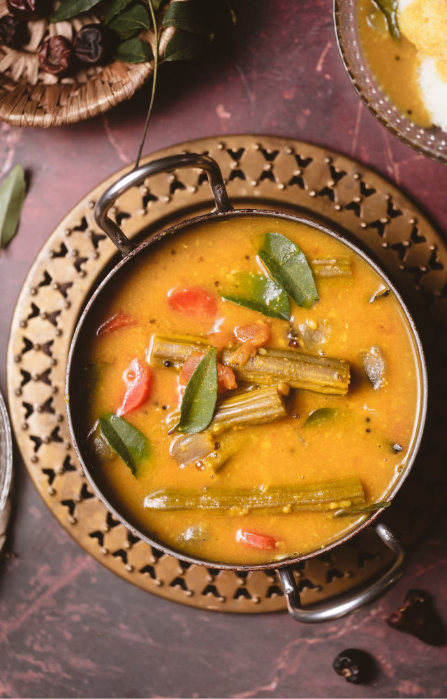 A spicy, tangy lentil-based stew with vegetables, often the centerpiece of the Onasadya meal.