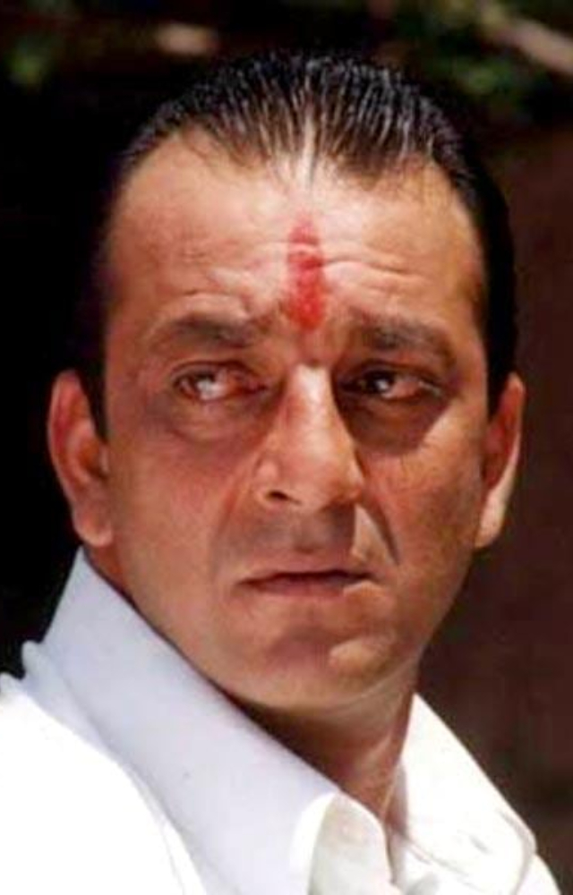 Sanju Baba played the role of Raghunath Namdev (Raghu), an innocent man who becomes the most feared and merciless gangster in Mumbai.