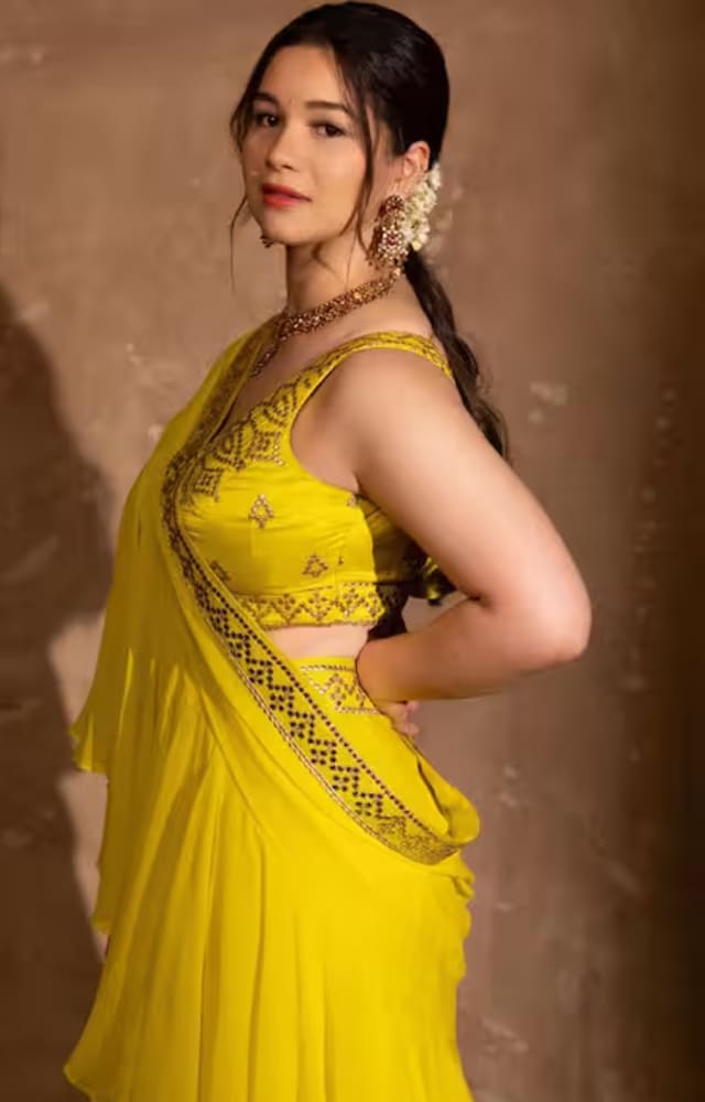 If you`re looking for inspiration for your friend`s Haldi ceremony, take cues from Sara`s yellow saree, customized by Gopi Vaid. She looks simply elegant.