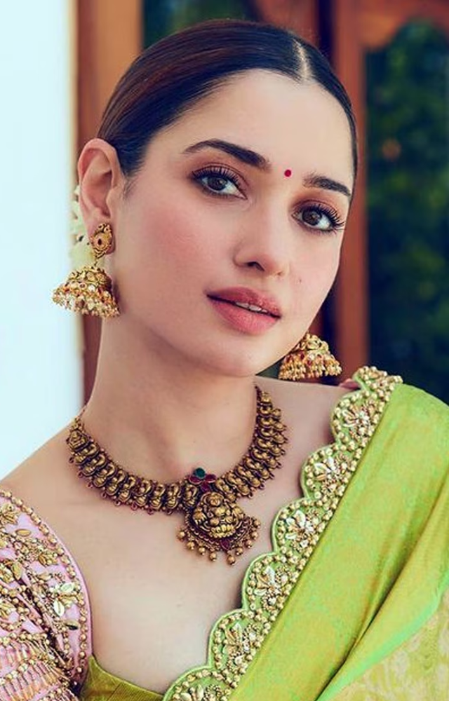 Tamannaah often chooses sarees with intricate embroidery and detailed designs that add to her allure.