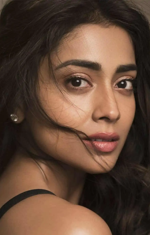 Shriya has demonstrated remarkable versatility by taking on diverse roles in films across Tamil, Telugu, Hindi, and Kannada languages.