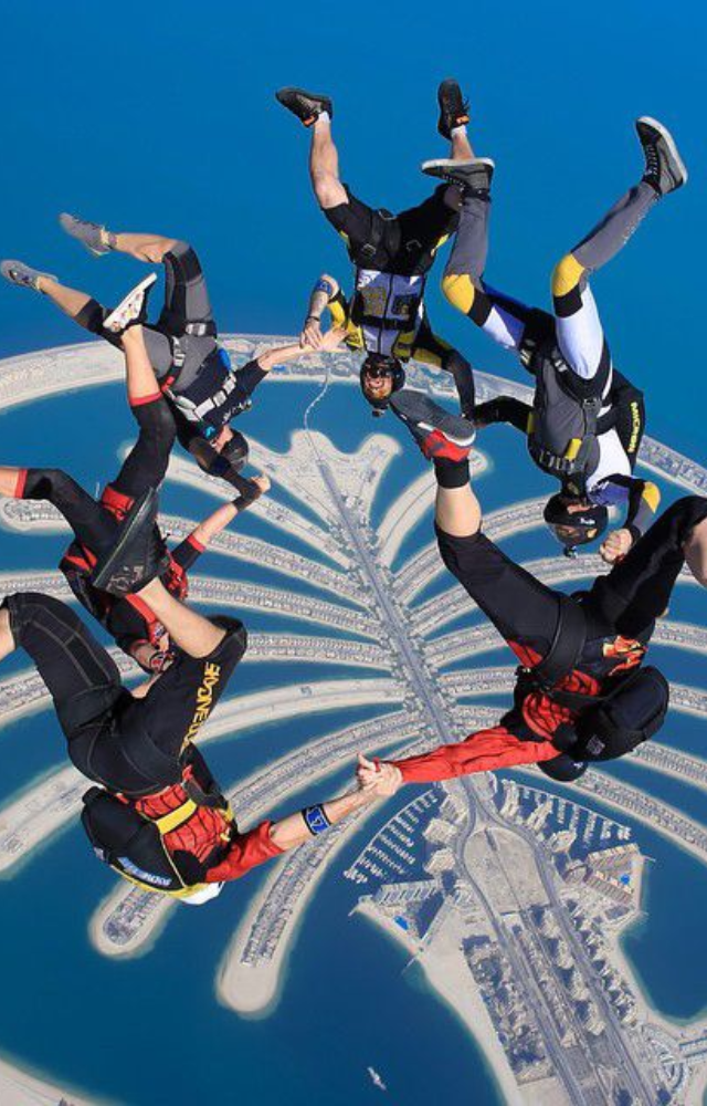 Enjoy a thrilling jump with stunning aerial views of the iconic man-made island and Dubai`s skyline.