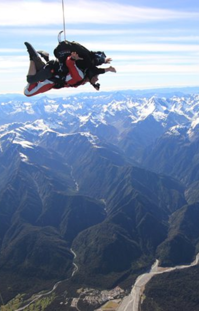 Experience the beauty of glaciers, mountains, and lush landscapes as you freefall.