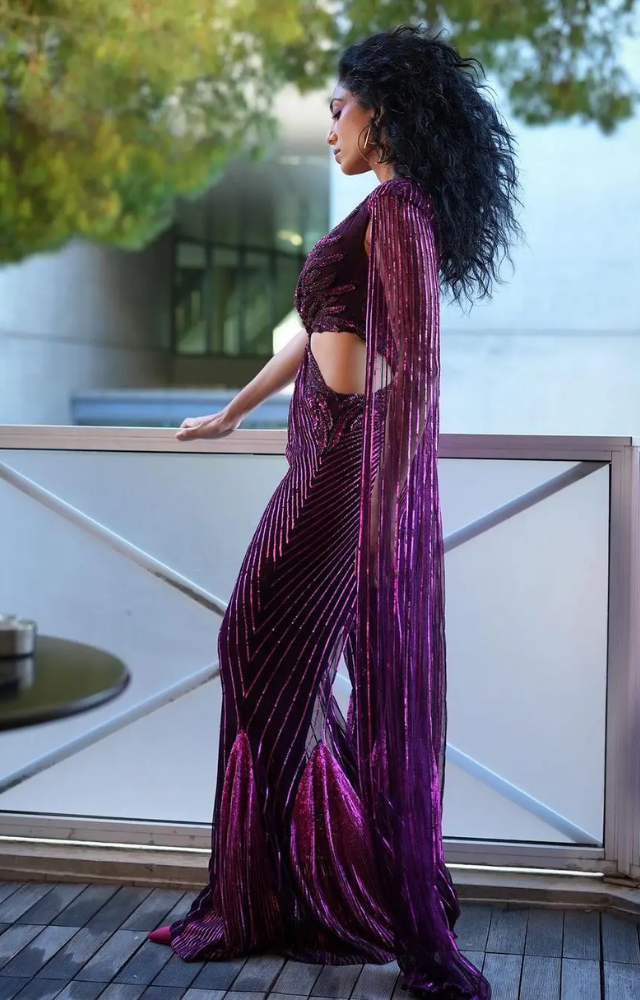 Her fans were captivated as she graced the red carpet in a sparkling purple jumpsuit.