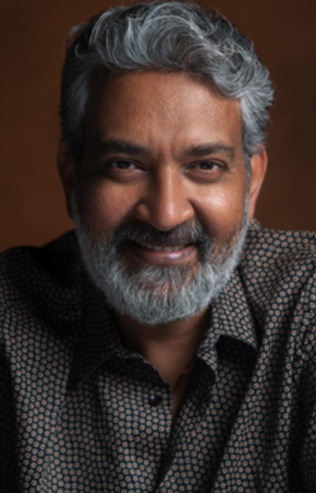 Rajamouli is known for creating epic narratives like Baahubali and RRR, blending mythology, history, and drama, making them landmarks in Indian cinema