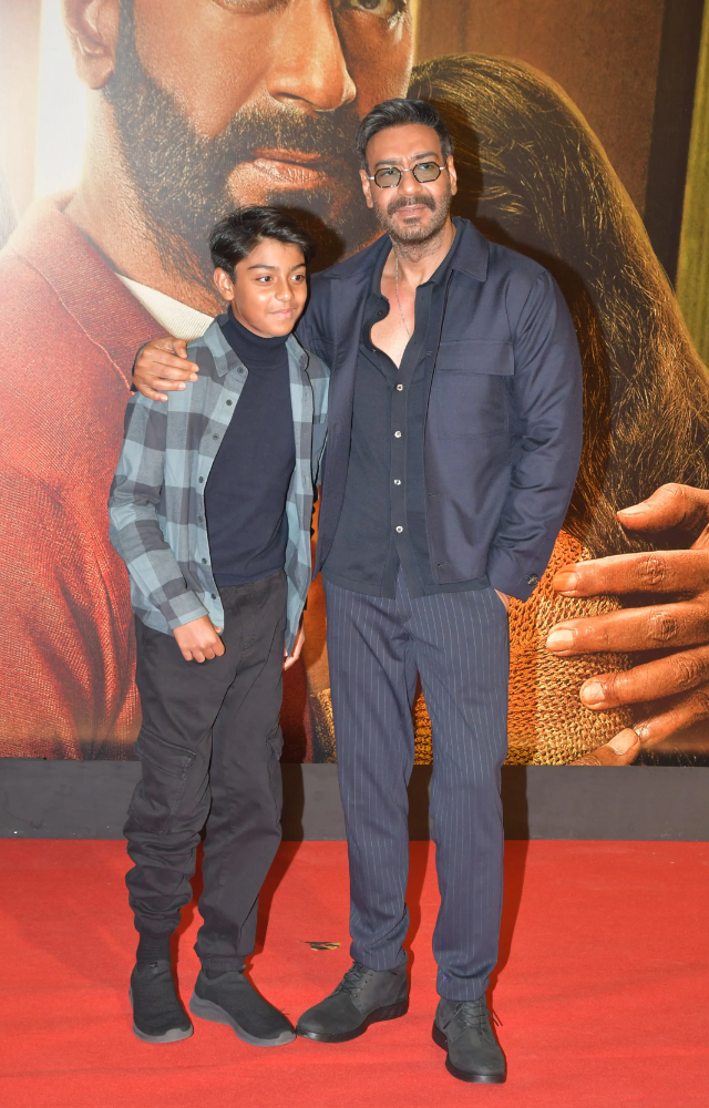 Ajay Devgn posed with his son Yug as the duo came to watch Shaitaan.