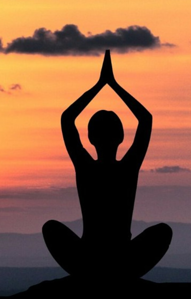 Yoga combines physical postures, breathing exercises, and meditation to promote relaxation and reduce stress