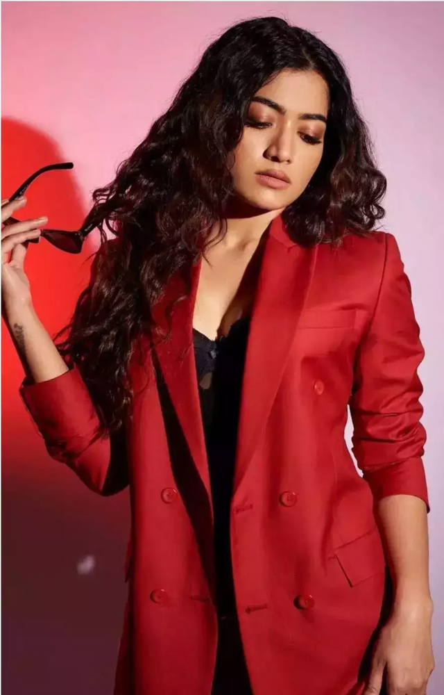 Known as the `National Crush`, Rashmika looks chic and elegant in suits, blending traditional and modern styles.