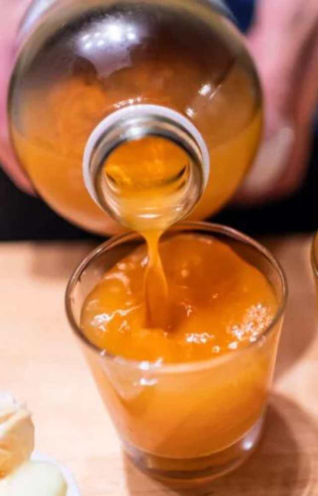 Drinking kombucha supports gut and liver health. It is a fermented and sweetened tea with probiotic bacteria and yeast.