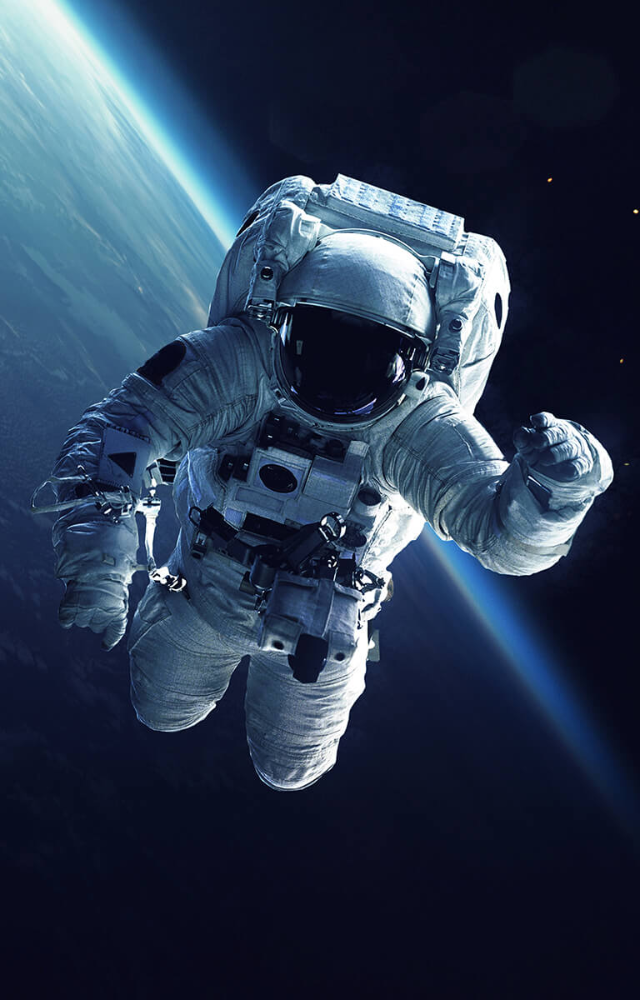 Bone density loss occurs due to a lack of gravity, making bones brittle and prone to fractures upon return to Earth.