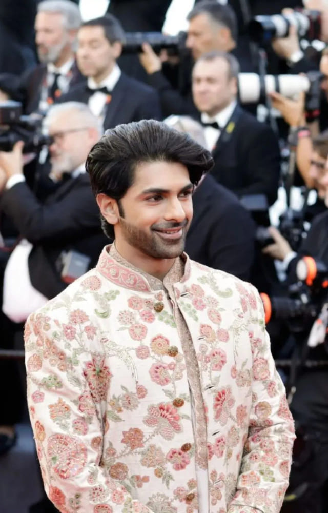 Heeramandi`s Tajdar, aka Taha Shah Badussha, walked the Cannes red carpet wearing Kanishka Mehta`s elegant couture as he looked absolutely dapper.