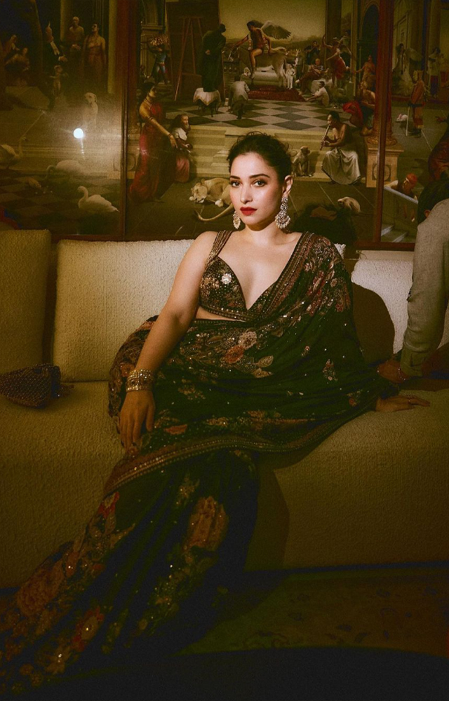 Tamannaah painted a wow picture in a shimmery dual-toned saree featuring shades of blue and purple from the shelves of Manish Malhotra.