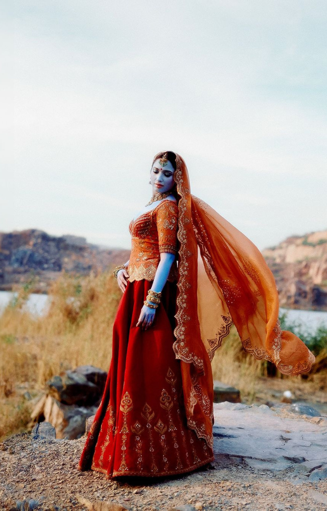 The actress looked beautiful in a shade of blue painted all over her body, depicting the depth of her love for Krishna.