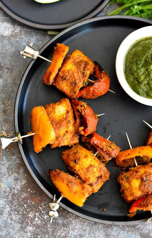 Firm fish fillets (like salmon, cod, or pomfret) marinated in yogurt, ginger-garlic paste, lemon juice, and tandoori spices.