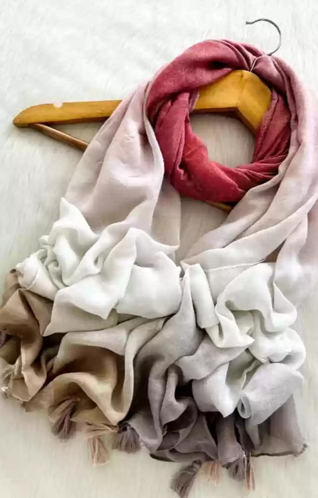 Cover up your face with cotton scarf. Additionally, wear full sleeved clothing to avoid getting a tan on your hands or legs.