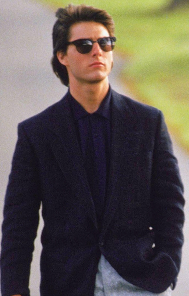 Cruise plays a self-centred yuppie who discovers his autistic savant older brother, leading to a life-changing road trip and critical acclaim.