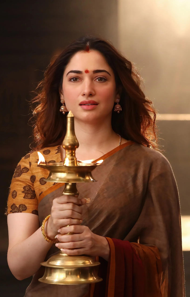 This is a horror comedy film released on May 3. The film stars Tamannaah as Selvi, who dies by suicide and her brother is left to uncover the secret behind it.